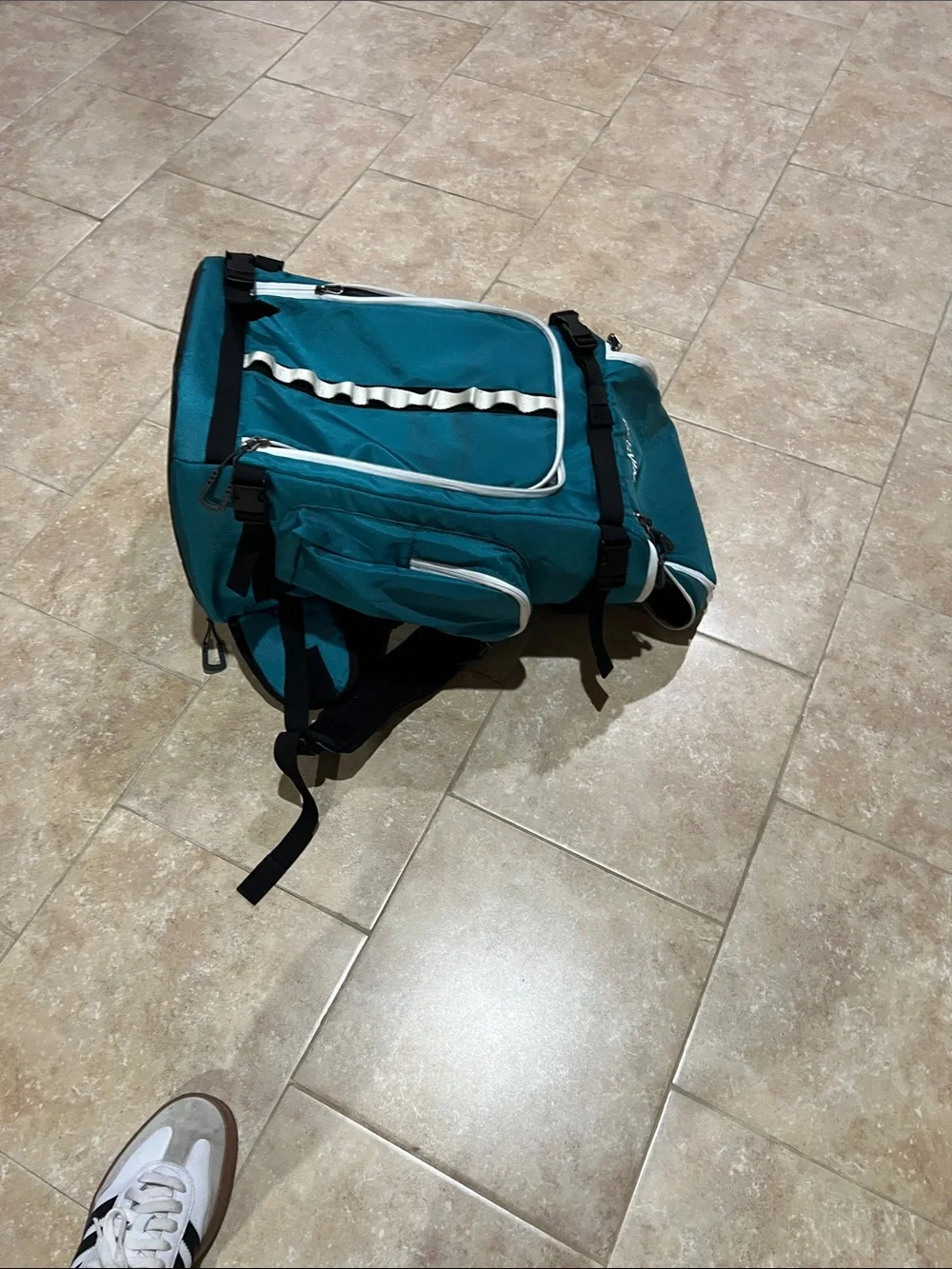 Teal Men's Travel Backpack with Multiple Compartments